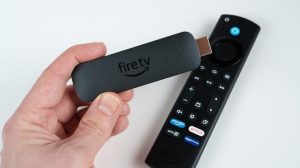 Firestick connected to a television with IPTV app open