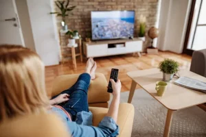 watching television at home